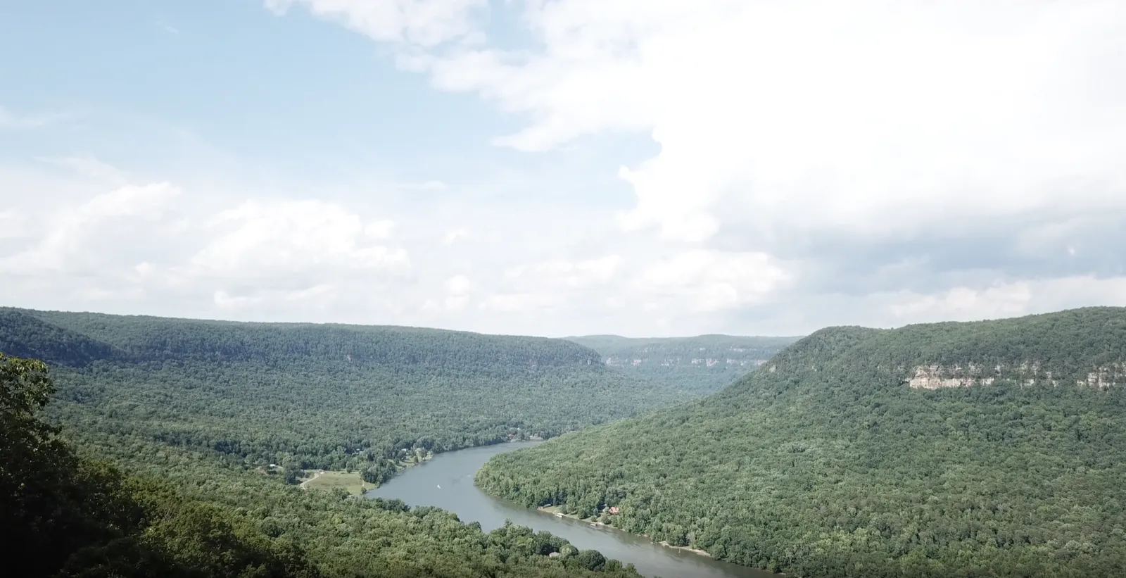 Wooded Tennessee Valley ridges under a summer sky